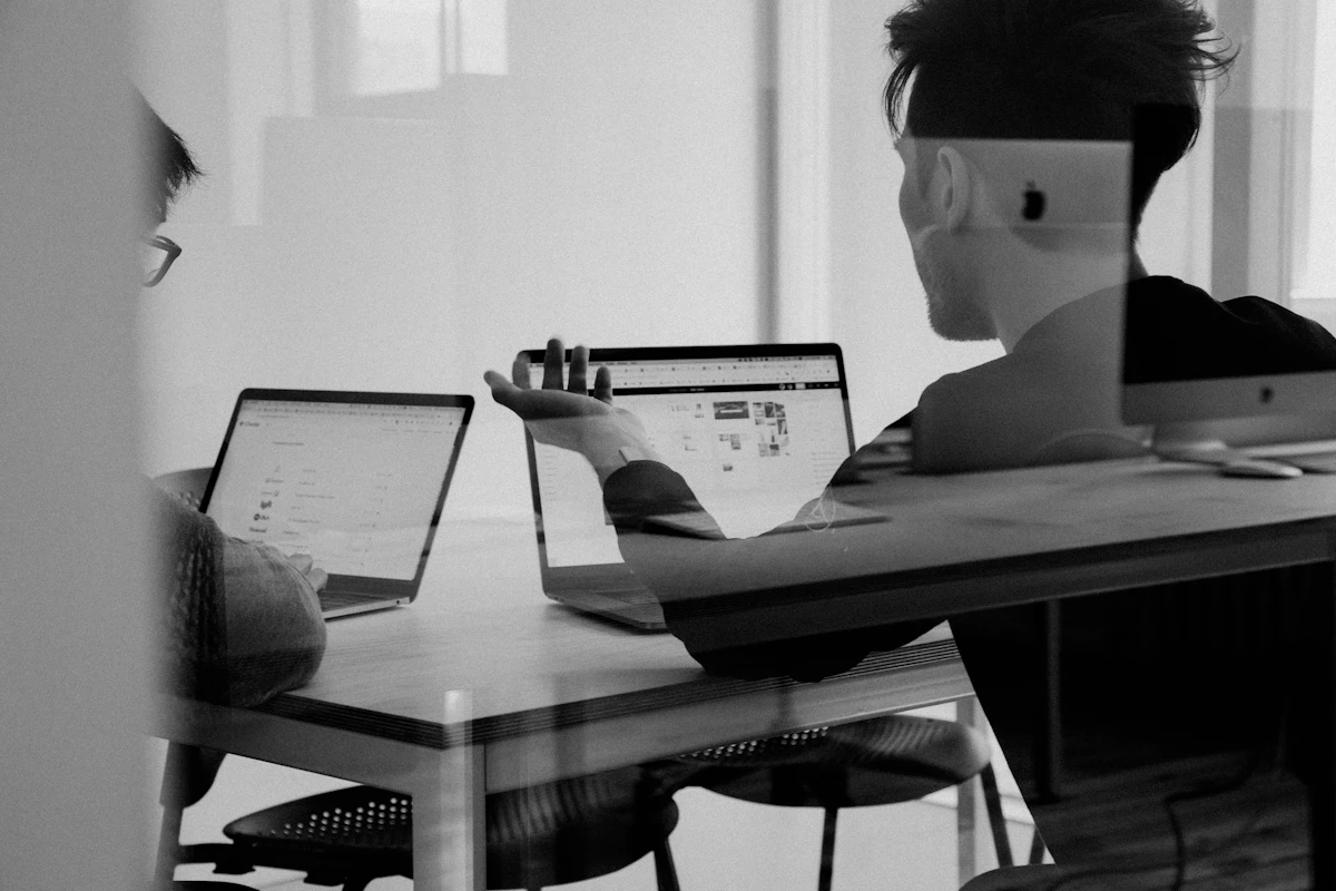 Corporate team reviewing visa documents in a modern office